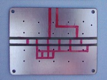 [Photograph of marked PCB]